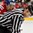 GRAND FORKS, NORTH DAKOTA - APRIL 16: Linesman Alexander Sysuev looks back before dropping the puck during preliminary round between Canada and the Czech Republic at the 2016 IIHF Ice Hockey U18 World Championship. (Photo by Minas Panagiotakis/HHOF-IIHF Images)

